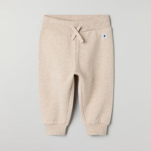 Soft Beige Baby Joggers from the Polarn O. Pyret baby collection. Ethically produced kids clothing.