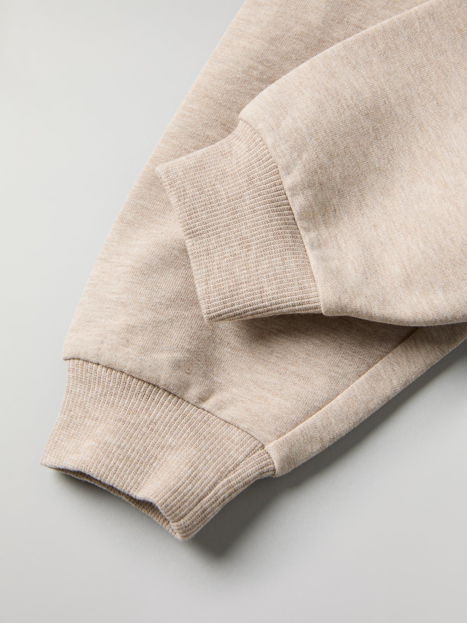 Soft Beige Baby Joggers from the Polarn O. Pyret baby collection. Ethically produced kids clothing.