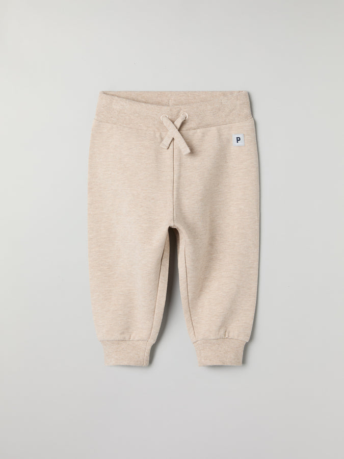 Soft Beige Baby Joggers from the Polarn O. Pyret baby collection. Ethically produced kids clothing.