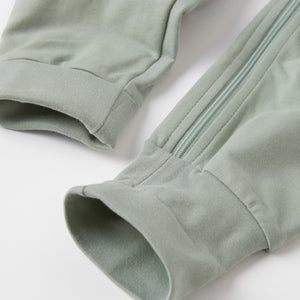 Green Organic Cotton Baby All-In-One from the Polarn O. Pyret baby collection. Nordic baby clothes made from sustainable sources.