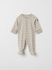 Organic Cotton Beige Baby Sleepsuit from the Polarn O. Pyret baby collection. Made using 100% GOTS Organic Cotton