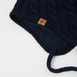 Wool Kids Navy Bobble Hat from the Polarn O. Pyret outerwear collection. Made using ethically sourced materials.